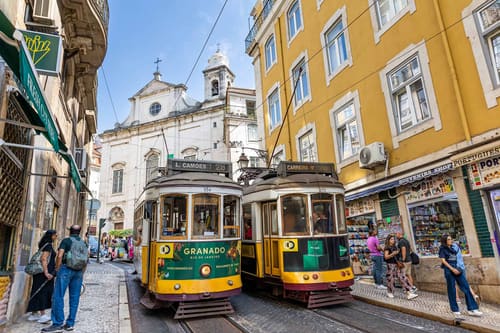 Yellow tram in the streets of Lisbon